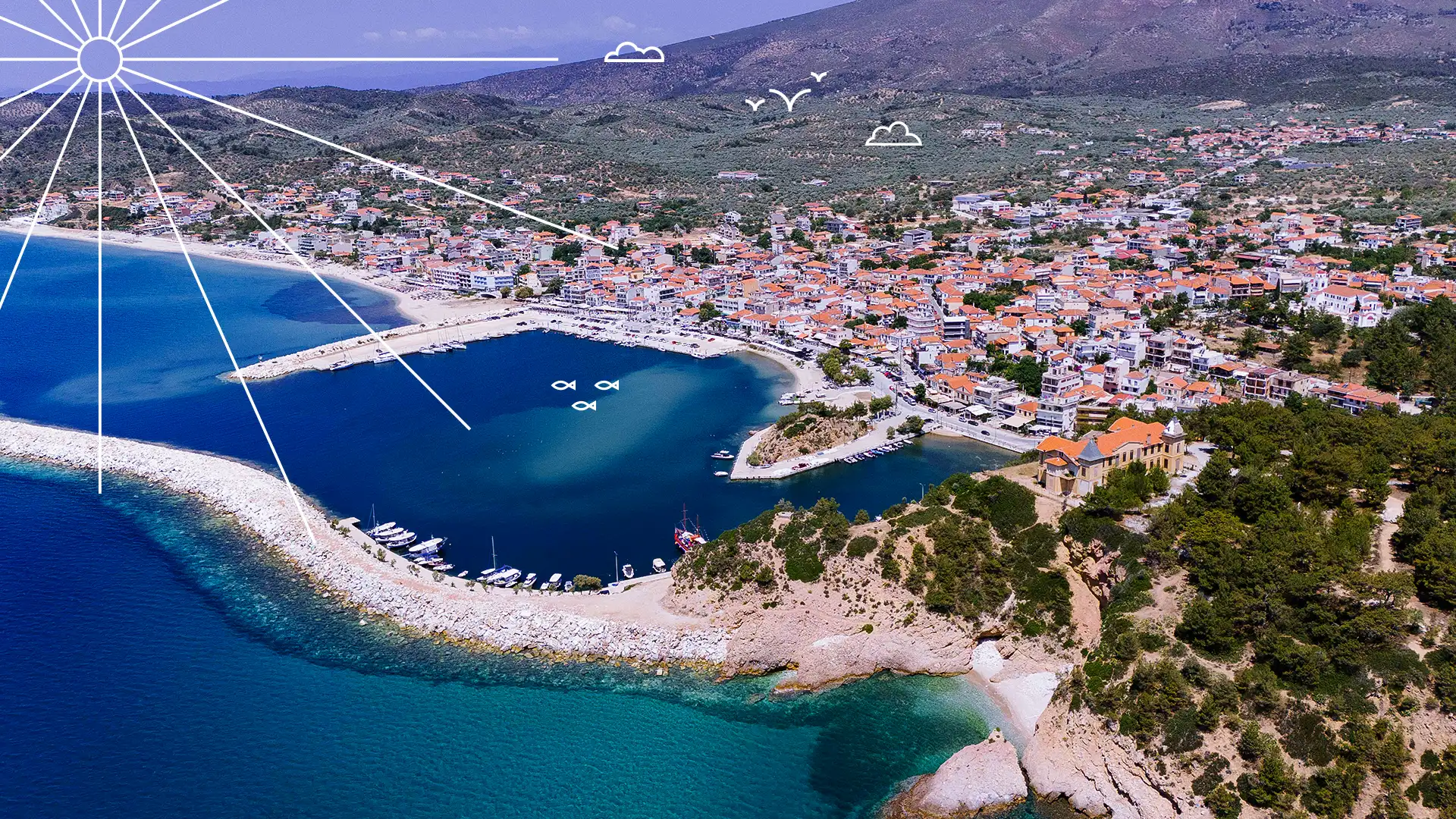 Aerial view of Metalia beach in Thassos with the seaside village of Limenaria, featuring Palataki on the hill and a small port Discover Thassos